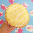 Load image into Gallery viewer, Lemon Drizzle Frosted Cookie
